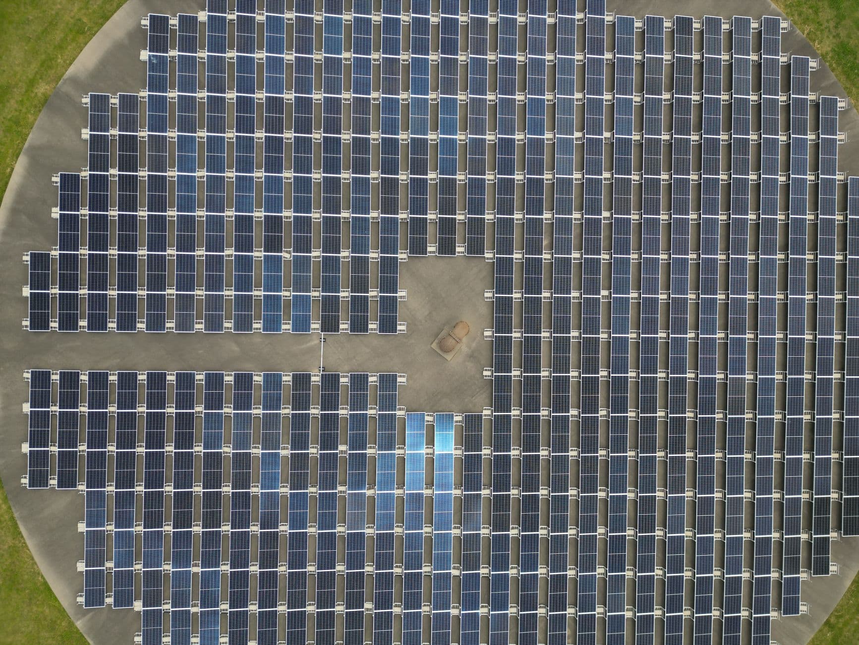 Aerial view of a large solar panel array generating renewable energy