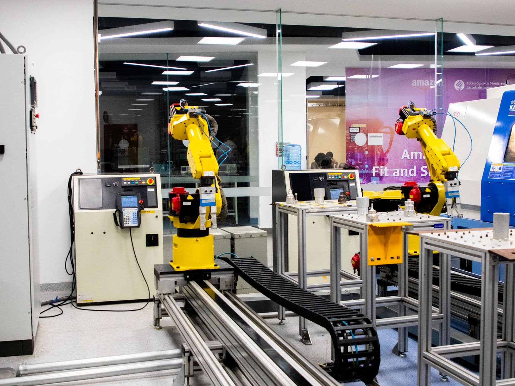 Robotic arms operating in an industrial control room for automated solar panel recycling