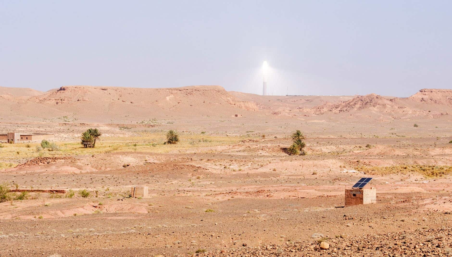 Atlas Mountains in Morocco with solar energy installations under a clear sky