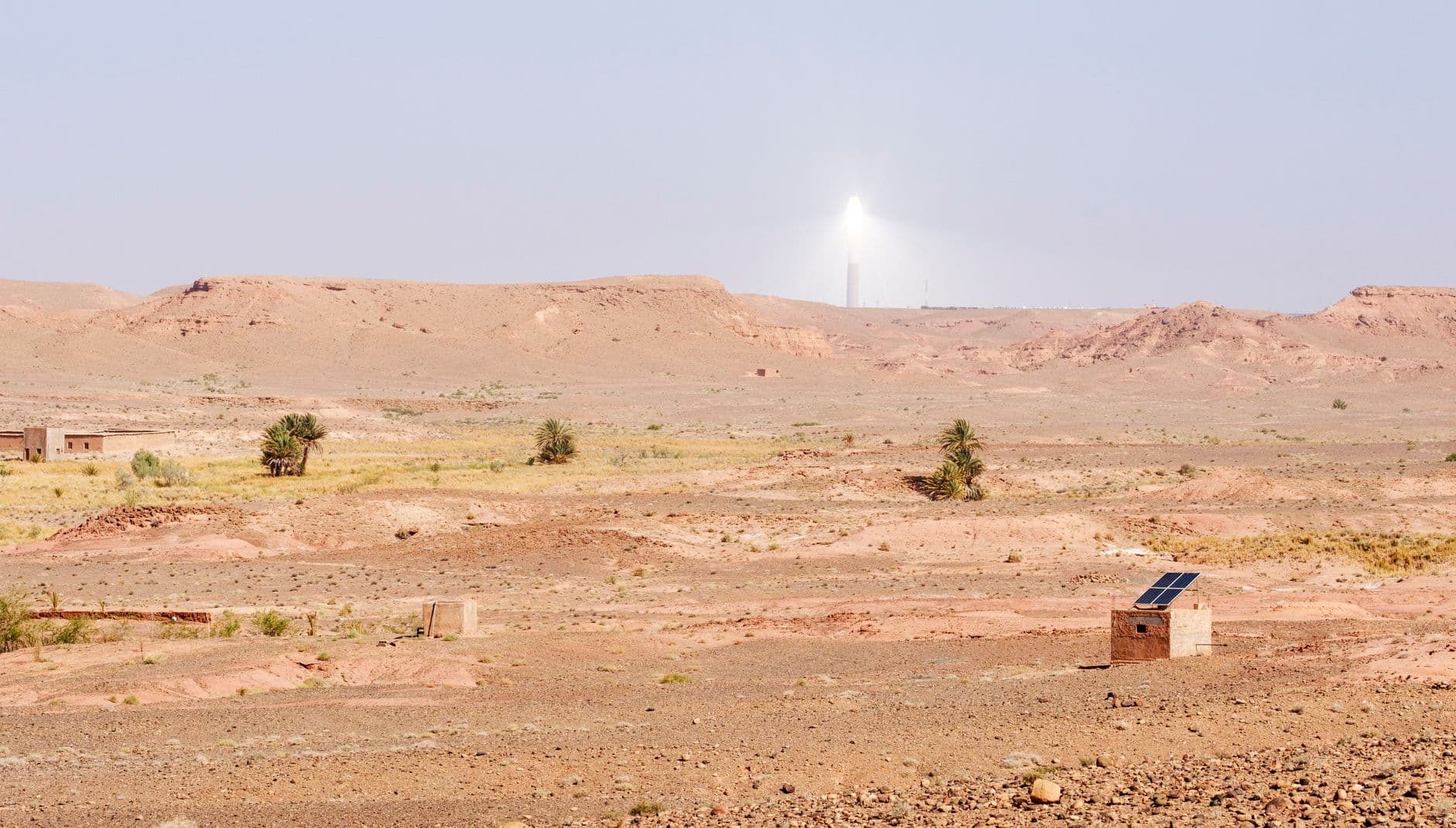 Atlas Mountains in Morocco with solar energy installations under a clear sky